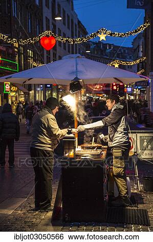 "Man selling chestnuts on Stroget, pedestrian zone, Copenhagen, Capital Region of Denmark, Denmark, Europe" View Large Photo Image Stock Photograph - "Man selling chestnuts on Stroget, pedestrian zone, Copenhagen, Capital Region of Denmark, Denmark, Europe". Fotosearch