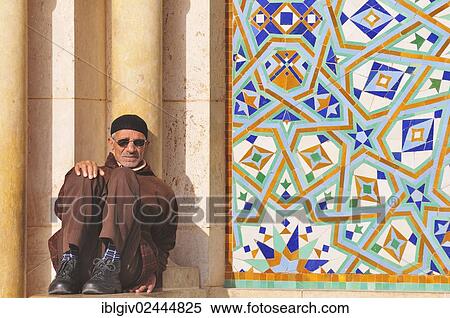 "Man sitting inside the Hassan II Mosque in Casablanca, Morocco, Africa" View Large Photo Image Stock Photography - "Man sitting inside the Hassan II Mosque in Casablanca, Morocco, Africa". Fotosearch