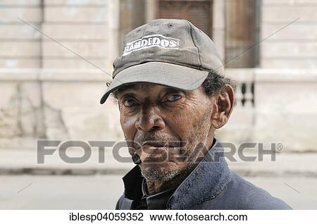 "Man smoking a cigar, portrait, Centro Habana, Havana, Ciudad de La Habana, Cuba, North America" View Large Photo Image Stock Image - "Man smoking a cigar, portrait, Centro Habana, Havana, Ciudad de La Habana, Cuba, North America". Fotosearch