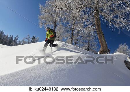 "Man snowshoeing, snowshoe tour in Berchtesgaden National Park, Berchtesgadener Land, Bavaria, Germany, Europe" View Large Photo Image Stock Image - "Man snowshoeing, snowshoe tour in Berchtesgaden National Park, Berchtesgadener Land, Bavaria, Germany, Europe". Fotosearch