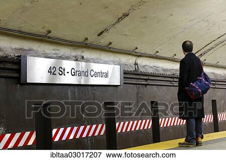 Stock Photo - "Man waiting for subway, Number 7 Subway, Grand Central Terminal, 42nd Street, Manhattan, New York City, New York, United States, North America". Fotosearch