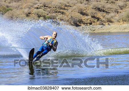 "Man water skiing on a monoski, Von Bach Dam, Namibia, Africa" View Large Photo Image Stock Photo - "Man water skiing on a monoski, Von Bach Dam, Namibia, Africa". Fotosearch