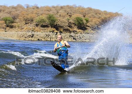 "Man water skiing on a monoski, Von Bach Dam, Namibia, Africa" View Large Photo Image Stock Photo - "Man water skiing on a monoski, Von Bach Dam, Namibia, Africa". Fotosearch