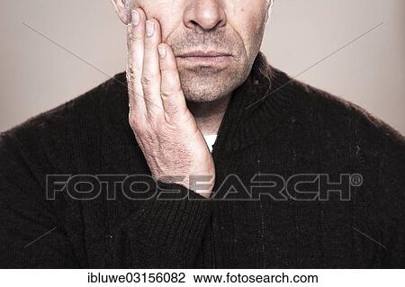 "Man wearing a sweater, concerned expression, Mannheim, Baden-Wurttemberg, Germany, Europe" View Large Photo Image Stock Image - "Man wearing a sweater, concerned expression, Mannheim, Baden-Wurttemberg, Germany, Europe". Fotosearch