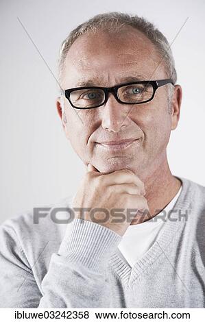 "Man wearing glasses, portrait, Mannheim, Baden-Wurttemberg, Germany, Europe" View Large Photo Image Stock Photo - "Man wearing glasses, portrait, Mannheim, Baden-Wurttemberg, Germany, Europe". Fotosearch