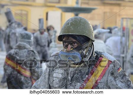 "Man wearing goggles, Els Enfarinats flour fight, rebels, armed with flour, eggs and firecrackers, take over the regiment of the city for one day, Plaza de la Iglesia, Ibi, Province of Alicante, Costa Blanca, Spain, Europe" View Large Photo Image Stock Image - "Man wearing goggles, Els Enfarinats flour fight, rebels, armed with flour, eggs and firecrackers, take over the regiment of the city for one day, Plaza de la Iglesia, Ibi, Province of Alicante, Costa Blanca, Spain, Europe". Fotosearch