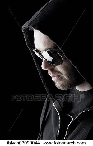 "Man wearing sunglasses and a hood, Innsbruck, Tyrol, Austria, Europe" View Large Photo Image Picture - "Man wearing sunglasses and a hood, Innsbruck, Tyrol, Austria, Europe". Fotosearch