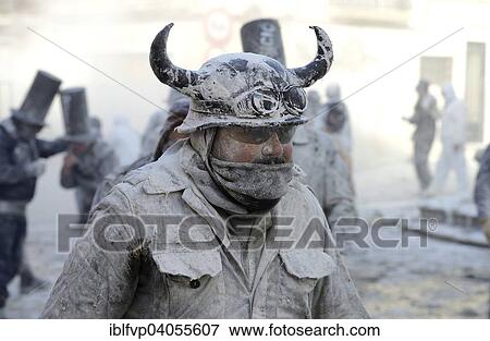 "Man wearing viking helmet, Els Enfarinats flour fight, rebels, armed with flour, eggs and firecrackers, take over the regiment of the city for one day, Plaza de la Iglesia, Ibi, Province of Alicante, Costa Blanca, Spain, Europe" View Large Photo Image Stock Photo - "Man wearing viking helmet, Els Enfarinats flour fight, rebels, armed with flour, eggs and firecrackers, take over the regiment of the city for one day, Plaza de la Iglesia, Ibi, Province of Alicante, Costa Blanca, Spain, Europe". Fotosearch