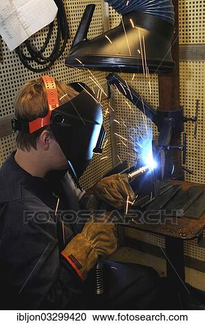 "Man welding at a vocational school, Ystad, Scania, Sweden, Europe" View Large Photo Image Stock Image - "Man welding at a vocational school, Ystad, Scania, Sweden, Europe". Fotosearch