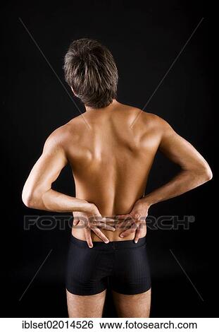 Man with back pain View Large Photo Image Stock Photograph - Man with back pain. Fotosearch