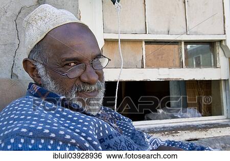 "Man with glasses wearing a Kufi hat, Bo-Kaap, Cape Town, Western Cape, South Africa, Africa" View Large Photo Image Stock Photograph - "Man with glasses wearing a Kufi hat, Bo-Kaap, Cape Town, Western Cape, South Africa, Africa". Fotosearch