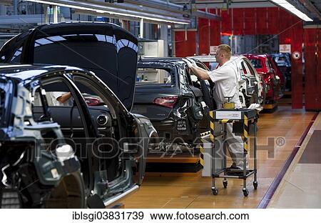 "Man working on the production line of the Audi A3 at the Audi plant, Ingolstadt, Bavaria, Germany, Europe" View Large Photo Image Stock Photo - "Man working on the production line of the Audi A3 at the Audi plant, Ingolstadt, Bavaria, Germany, Europe". Fotosearch