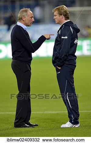 "Manager sporting director Andreas Mueller, TSG 1899 Hoffenheim, left, talking with coach Michael Bueskens, SpVgg Greuther Furth, right, Wirsol Rhein-Neckar-Arena in Sinsheim-Hoffenheim, Baden-Wuerttemberg, Germany, Europe" View Large Photo Image Stock Image - "Manager sporting director Andreas Mueller, TSG 1899 Hoffenheim, left, talking with coach Michael Bueskens, SpVgg Greuther Furth, right, Wirsol Rhein-Neckar-Arena in Sinsheim-Hoffenheim, Baden-Wuerttemberg, Germany, Europe". Fotosearch