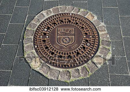 Stock Photo - "Manhole cover, List, Sylt, Schleswig-Holstein, Germany, Europe". Fotosearch