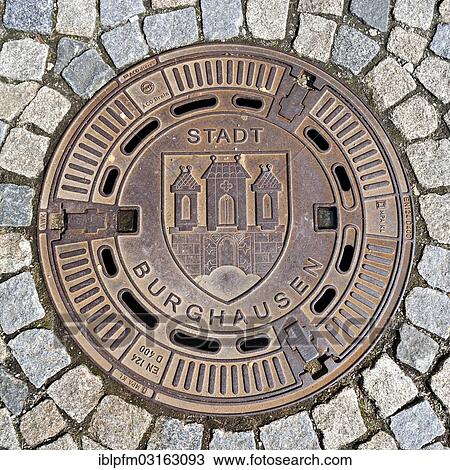 "Manhole cover with the coat of arms of Burghausen, Burghausen, Upper Bavaria, Bavaria, Germany, Europe" View Large Photo Image Stock Image - "Manhole cover with the coat of arms of Burghausen, Burghausen, Upper Bavaria, Bavaria, Germany, Europe". Fotosearch