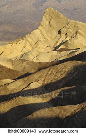 "Manly Beacon in the morning light, a rocky outcrop in the badlands below Zabriskie Point, Death Valley National Park, California, USA" View Large Photo Image Stock Image - "Manly Beacon in the morning light, a rocky outcrop in the badlands below Zabriskie Point, Death Valley National Park, California, USA". Fotosearch