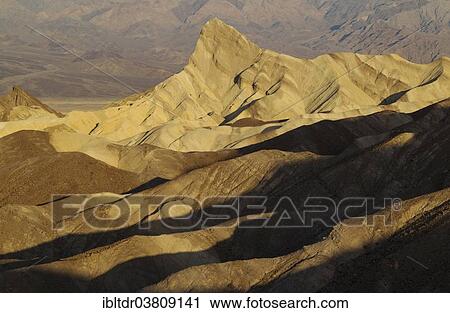"Manly Beacon in the morning light, a rocky outcrop in the badlands below Zabriskie Point, Death Valley National Park, California, USA" View Large Photo Image Stock Image - "Manly Beacon in the morning light, a rocky outcrop in the badlands below Zabriskie Point, Death Valley National Park, California, USA". Fotosearch