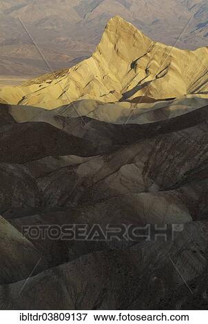"Manly Beacon in the morning light, a rocky outcrop in the badlands below Zabriskie Point, Death Valley National Park, California, USA" View Large Photo Image Stock Photo - "Manly Beacon in the morning light, a rocky outcrop in the badlands below Zabriskie Point, Death Valley National Park, California, USA". Fotosearch