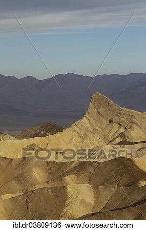 "Manly Beacon in the morning light, a rocky outcrop in the badlands below Zabriskie Point, Death Valley National Park, California, USA" View Large Photo Image Stock Photograph - "Manly Beacon in the morning light, a rocky outcrop in the badlands below Zabriskie Point, Death Valley National Park, California, USA". Fotosearch