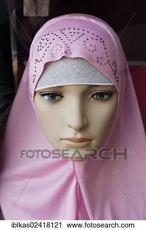 Mannequin wearing a fashionable Arab headscarf, Deira, Old Souk, Dubai, United Arab Emirates, Middle East, Asia View Large Photo Image Stock Image - Mannequin wearing a fashionable Arab headscarf, Deira, Old Souk, Dubai, United Arab Emirates, Middle East, Asia. Fotosearch