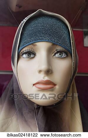 Mannequin wearing a fashionable Arab headscarf, Deira, Old Souk, Dubai, United Arab Emirates, Middle East, Asia View Large Photo Image Stock Image - Mannequin wearing a fashionable Arab headscarf, Deira, Old Souk, Dubai, United Arab Emirates, Middle East, Asia. Fotosearch