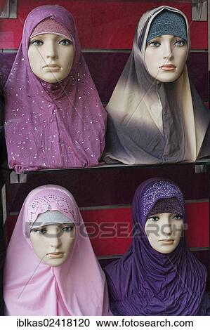 Mannequins wearing fashionable Arab headscarfs, Deira, Old Souk, Dubai, United Arab Emirates, Middle East, Asia View Large Photo Image Stock Image - Mannequins wearing fashionable Arab headscarfs, Deira, Old Souk, Dubai, United Arab Emirates, Middle East, Asia. Fotosearch