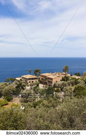 "Mansions on the coast near Deia, Serra de Tramuntana, northwest coast, Mallorca, Balearic Islands, Mediterranean Sea, Spain, Europe" View Large Photo Image Stock Image - "Mansions on the coast near Deia, Serra de Tramuntana, northwest coast, Mallorca, Balearic Islands, Mediterranean Sea, Spain, Europe". Fotosearch