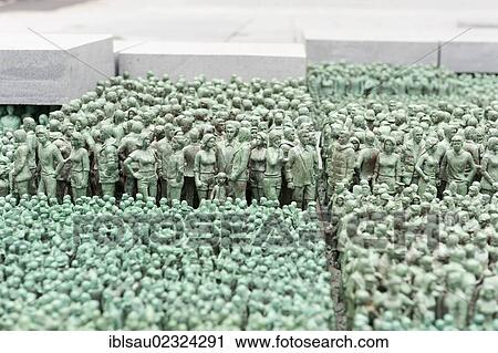 Stock Image - "Many bronze figures of people, Democracy Monument in the Government District, Oslo, Norway, Scandinavia, Northern Europe, Europe". Fotosearch