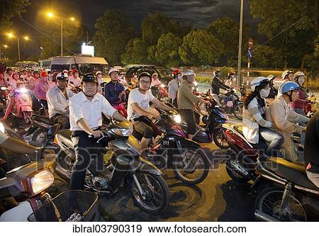 "Many motorcyclists, traffic, at dusk, Ho Chi Minh City, Vietnam, Asia" View Large Photo Image Stock Photo - "Many motorcyclists, traffic, at dusk, Ho Chi Minh City, Vietnam, Asia". Fotosearch