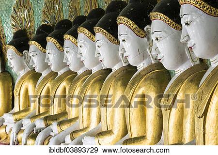 "Many seated Buddha sculptures, walls decorated with glass mosaics, Umin Thounzeh, Umin Thonse or U Min Thonze Pagoda or 30 Caves Pagoda, Sagaing Hills near Mandalay, Myanmar, Asia" View Large Photo Image Stock Photo - "Many seated Buddha sculptures, walls decorated with glass mosaics, Umin Thounzeh, Umin Thonse or U Min Thonze Pagoda or 30 Caves Pagoda, Sagaing Hills near Mandalay, Myanmar, Asia". Fotosearch