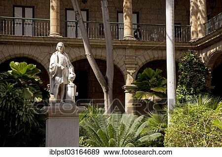 Stock Photo - "Marble statue of Christopher Columbus in the courtyard of the Palacio de los Capitanes Generales, former Governor's Palace and now the city museum, Havana, Cuba, North America". Fotosearch