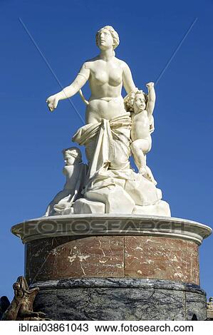 Stock Image - "Marble statue of the goddess Latona, Fountain of Latona, Herrenchiemsee New Palace, Schlosspark palace gardens, Herreninsel island, Chiemsee lake, Chiemgau, Upper Bavaria, Bavaria, Germ". Fotosearch