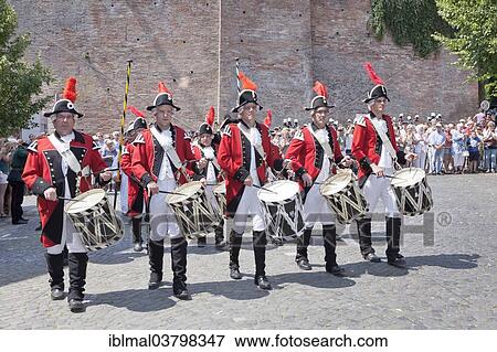 "Marching band wearing the uniforms of the Ulm town soldiers, Fischerstechen or water jousting festival, Ulm, Baden-Wurttemberg, Germany, Europe" View Large Photo Image Stock Photo - "Marching band wearing the uniforms of the Ulm town soldiers, Fischerstechen or water jousting festival, Ulm, Baden-Wurttemberg, Germany, Europe". Fotosearch