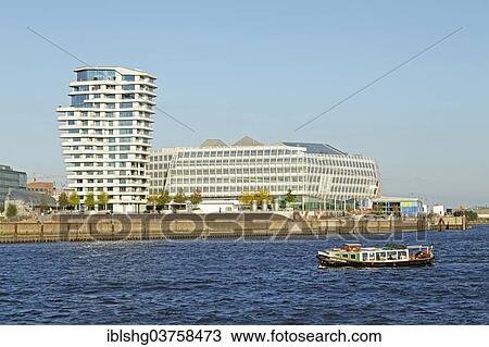 Stock Image - "Marco Polo Tower and the Unilever House, HafenCity, Hamburg, Hamburg, Germany, Europe". Fotosearch