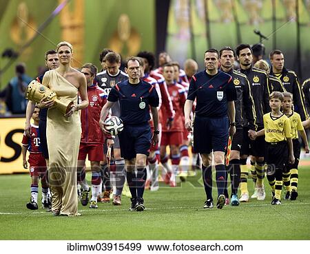 "Maria Hofl-Riesch carries the DFB Cup into the stadium, opening ceremony, DFB Cup final, Olympiastadion, Berlin, Germany, Europe" View Large Photo Image Stock Photo - "Maria Hofl-Riesch carries the DFB Cup into the stadium, opening ceremony, DFB Cup final, Olympiastadion, Berlin, Germany, Europe". Fotosearch