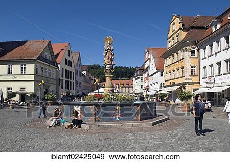 Marienbrunnen fountain with column from the Renaissance, crowned by a double image of the Madonna in a steel ring, dated 1686, Schwaebisch Gmuend, Baden-Wuerttemberg, Germany, Europe View Large Photo Image Stock Photo - Marienbrunnen fountain with column from the Renaissance, crowned by a double image of the Madonna in a steel ring, dated 1686, Schwaebisch Gmuend, Baden-Wuerttemberg, Germany, Europe. Fotosearch