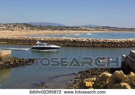 Stock Image - "Marina, harbour entrance, Lagos, Algarve, Portugal, Europe". Fotosearch