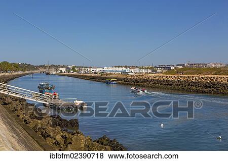 Stock Photo - "Marina, harbour entrance, Lagos, Algarve, Portugal, Europe". Fotosearch