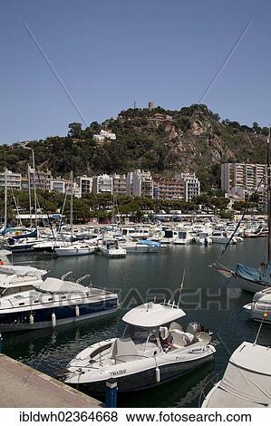 "Marina in front of the hill with Castell Ermita de Sant Joan Castle, Blanes, La Selva, Costa Brava, Catalonia, Spain, Europe, PublicGround, Europe" View Large Photo Image Stock Photo - "Marina in front of the hill with Castell Ermita de Sant Joan Castle, Blanes, La Selva, Costa Brava, Catalonia, Spain, Europe, PublicGround, Europe". Fotosearch