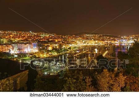 Stock Image - "Marina of Kusadasi at night, Kusadasi, Aydin province, Aegean region, Turkey, Asia". Fotosearch