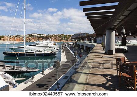 "Marina of Port Adriano, designed by Philippe Starck, Port Adriano, El Toro, Mallorca, Majorca, Balearic Islands, Mediterranean Sea, Spain, Europe" View Large Photo Image Stock Photo - "Marina of Port Adriano, designed by Philippe Starck, Port Adriano, El Toro, Mallorca, Majorca, Balearic Islands, Mediterranean Sea, Spain, Europe". Fotosearch