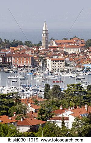 "Marina on the Adriatic coast with the historic town centre of Izola, Slovenia, Europe, Izola, Slovenian Littoral, Slovenia, Europe" View Large Photo Image Stock Photo - "Marina on the Adriatic coast with the historic town centre of Izola, Slovenia, Europe, Izola, Slovenian Littoral, Slovenia, Europe". Fotosearch