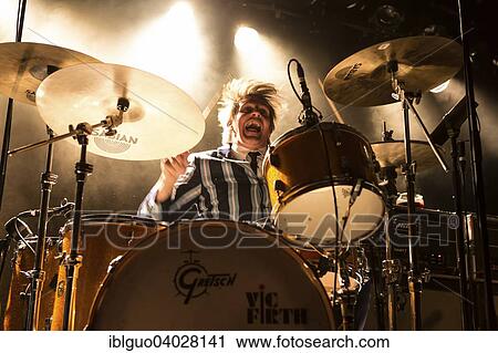 Stock Image - "Mario Goossens, drummer of the Belgian rock band Triggerfinger, live in the Schuur, Lucerne, Switzerland, Europe". Fotosearch