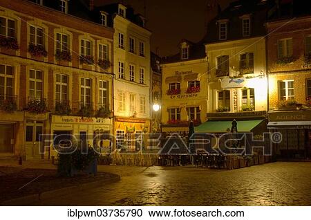 Stock Image - "Market place and restaurants at night, Honfleur, Normandy, France, Europe". Fotosearch