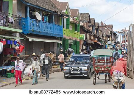 Stock Photography - "Market, Pousse Pousse, busy main road of Ambositra, Madagascar, Africa". Fotosearch
