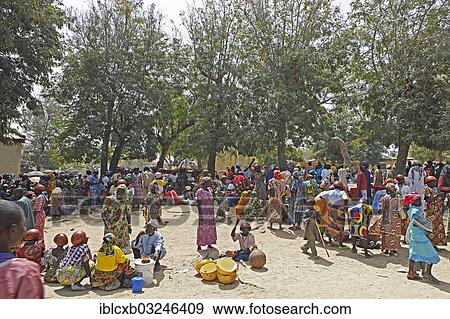 "Market scene, women wearing typical calabash helmets and colourful dresses, Tourou, Far North, Cameroon, Africa" View Large Photo Image Stock Photo - "Market scene, women wearing typical calabash helmets and colourful dresses, Tourou, Far North, Cameroon, Africa". Fotosearch