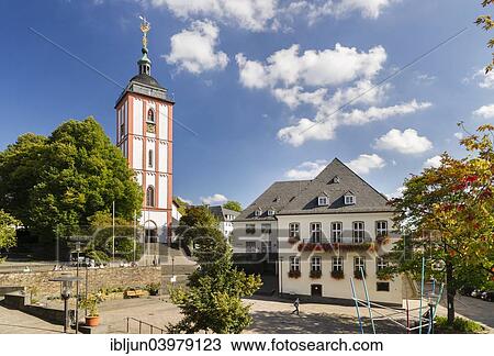 "Market square, Town Hall, Nikolaikirche Church with the landmark """"Das Kronchen"""", golden crown on top of the church tower, Siegen, North Rhine-Westphalia, Germany, Europe" View Large Photo Image Stock Image - "Market square, Town Hall, Nikolaikirche Church with the landmark """"Das Kronchen"""", golden crown on top of the church tower, Siegen, North Rhine-Westphalia, Germany, Europe". Fotosearch