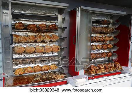 "Market stall with a chicken grill and fried chicken, Bedoin, Vaucluse, Provence-Alpes-Cote d'Azur, Southern France, France, Europe" View Large Photo Image Stock Photo - "Market stall with a chicken grill and fried chicken, Bedoin, Vaucluse, Provence-Alpes-Cote d'Azur, Southern France, France, Europe". Fotosearch