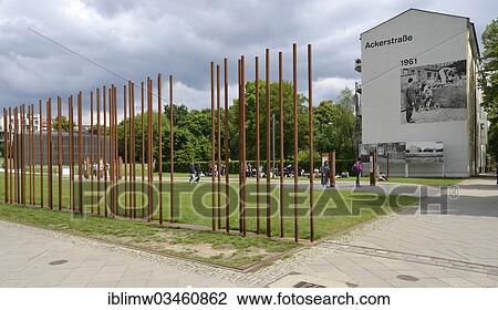 "Marking of the path of the Wall through steel beams, photo showing the construction of the wall on a building on Ackerstrasse, Berlin Wall Memorial, Bernauer Strasse, Berlin, Berlin, Germany, Europe" View Large Photo Image Stock Image - "Marking of the path of the Wall through steel beams, photo showing the construction of the wall on a building on Ackerstrasse, Berlin Wall Memorial, Bernauer Strasse, Berlin, Berlin, Germany, Europe". Fotosearch
