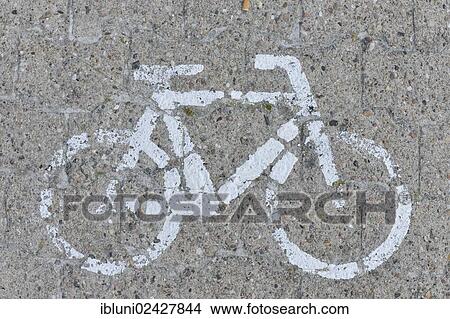 "Marking on a bike path, pictogram of a bicycle on the road" View Large Photo Image Picture - "Marking on a bike path, pictogram of a bicycle on the road". Fotosearch